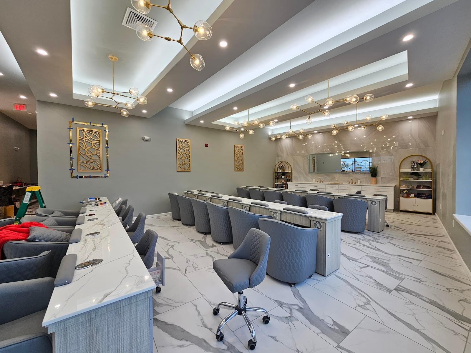 Commercial interior finished with pendant and cove lighting installed by Pika Electrical